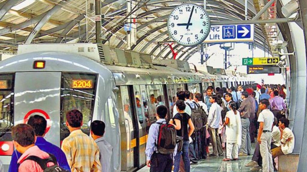 Busy street view of Dwarka Mor with metro station, shops, and residential buildings in Delhi NCR.