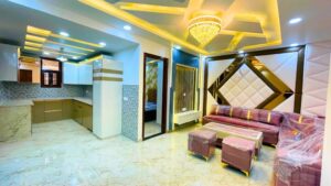 Modern furnished living room with modular kitchen design