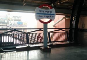 Uttam Nagar East metro sign