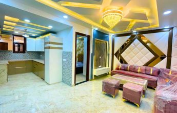 Modern furnished living room with modular kitchen design