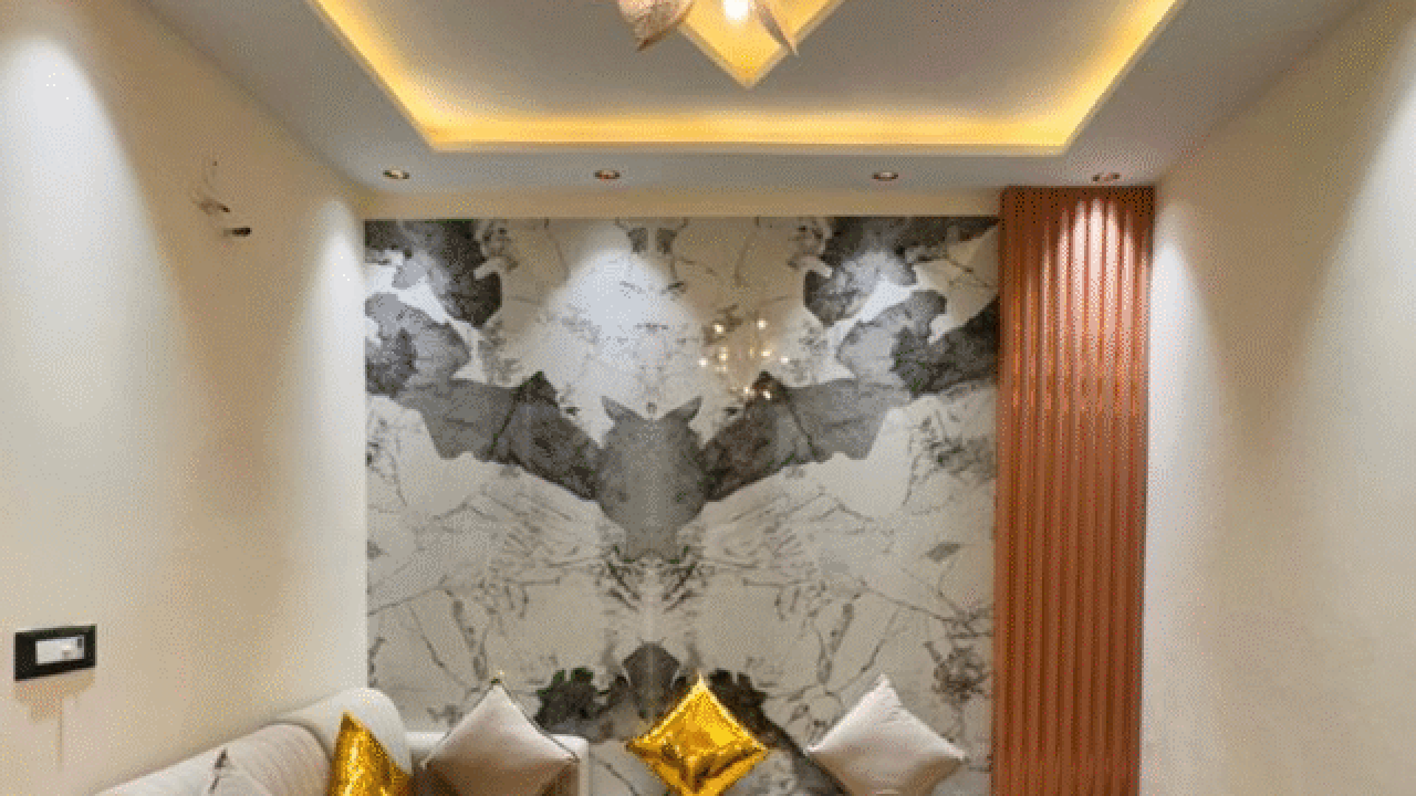 Stylish living room with chandelier and marble accent wall
