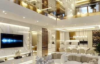 Modern living room with elegant lighting, plush seating, and a chandelier.
