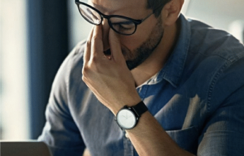Stressed man at laptop