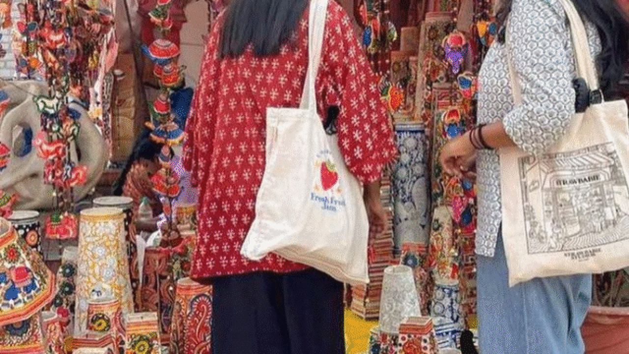 Women at handicraft stall.