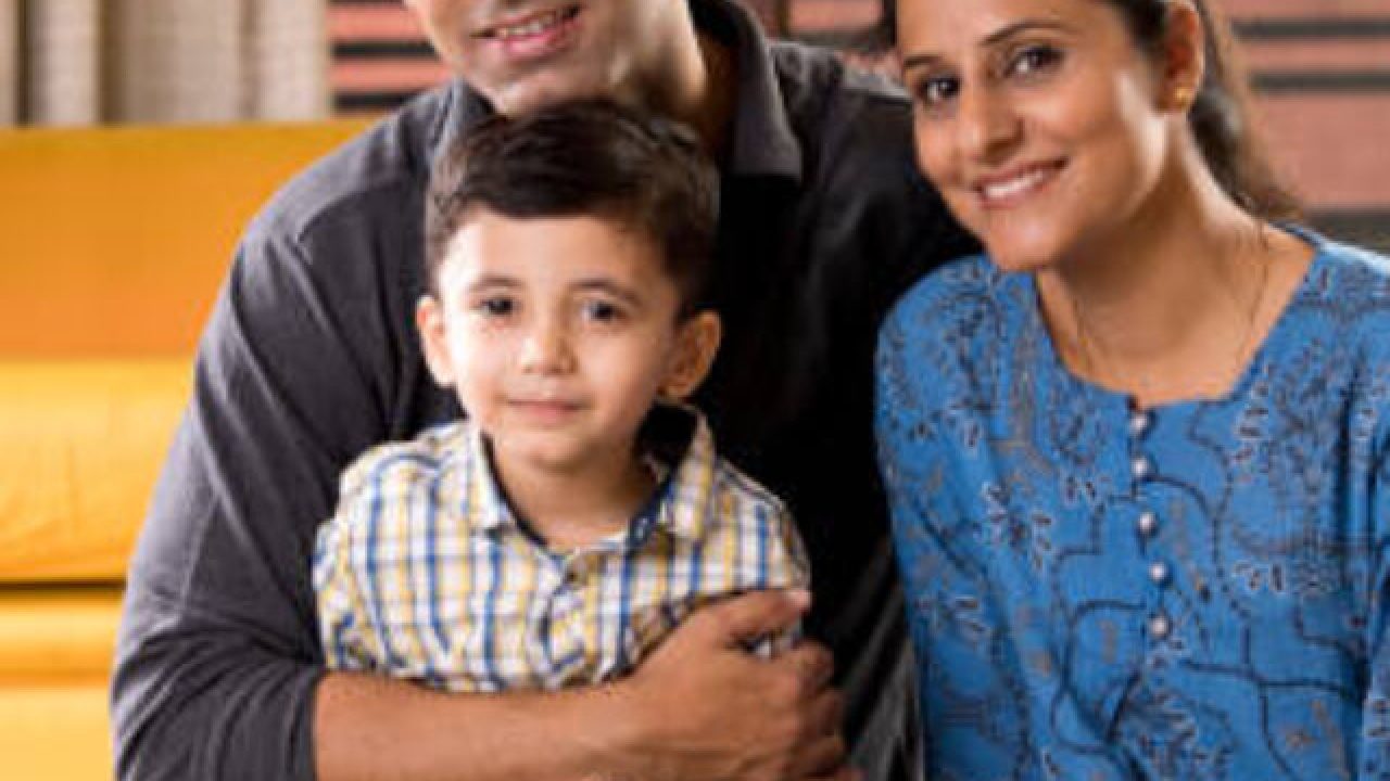 Parents having fun with kid at home